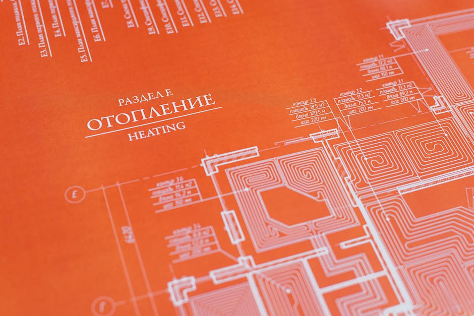 Orange background blueprint showcasing a detailed heating system design plan.