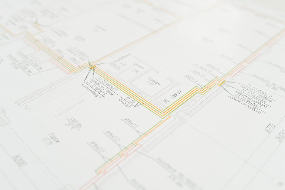 Close-up view of an architectural blueprint, showcasing intricate design details.