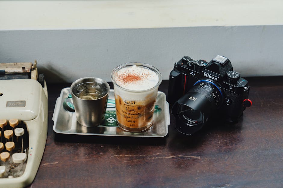 A vintage coffee setup with a retro camera, perfect for a nostalgic feel.