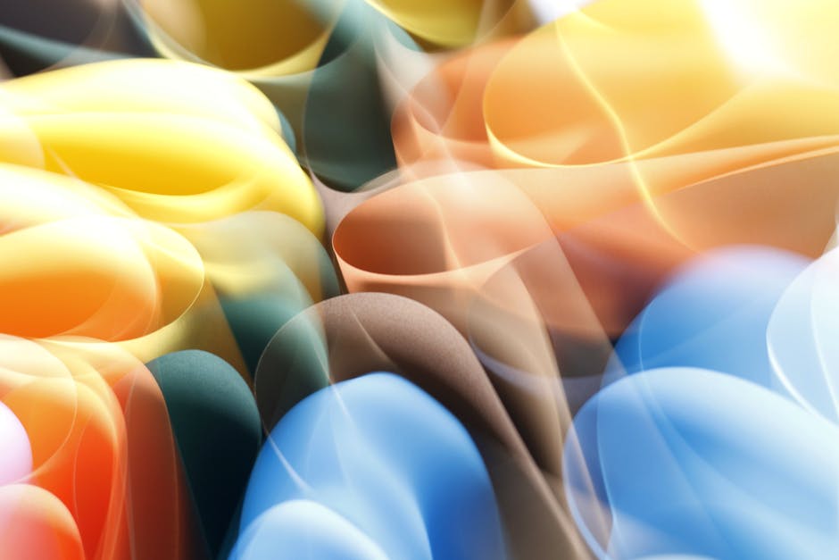 Bright and dynamic abstract artwork with flowing colorful shapes and smooth transitions.