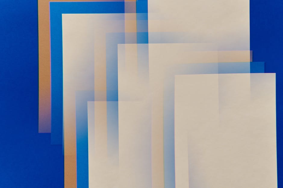 A blue SIM card on a dark background with vibrant red and purple accents.