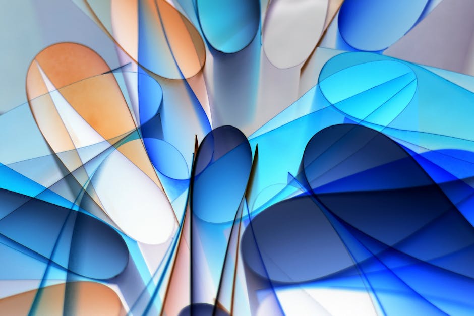 Vibrant abstract art with blue and orange shapes overlapping to form a mesmerizing pattern.