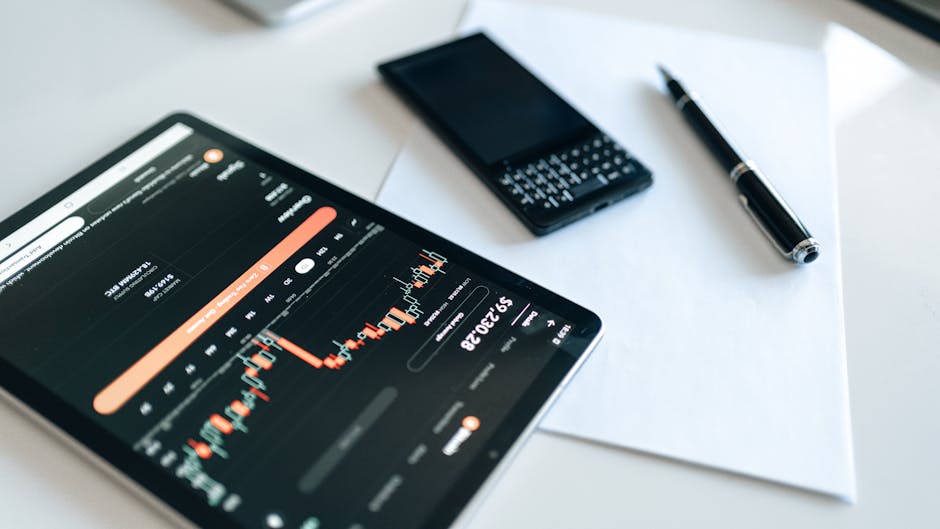 Close-up view of a sleek digital car dashboard featuring a modern speedometer and tachometer.