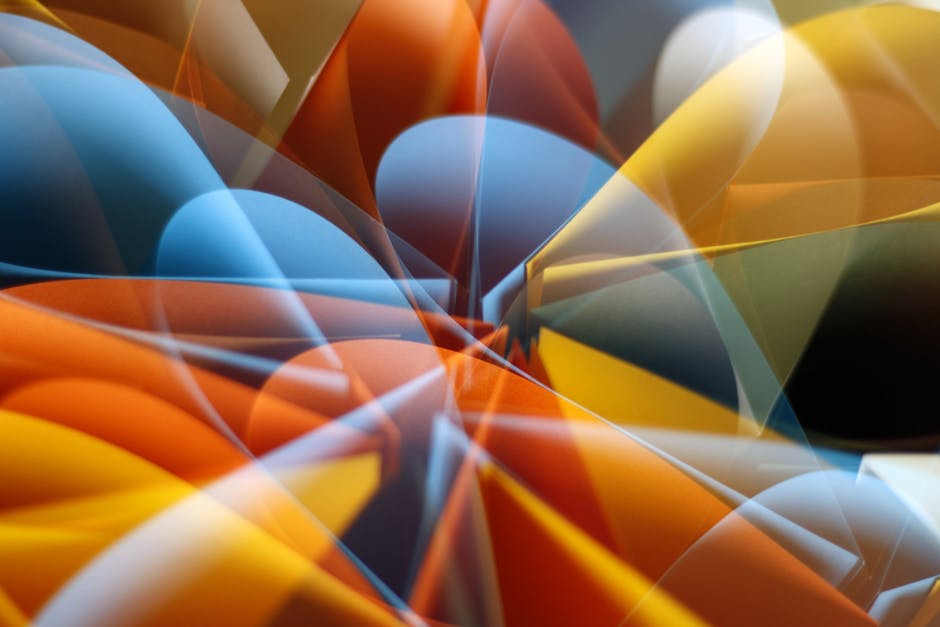 Vibrant abstract image with overlapping colorful shapes creating a dynamic pattern.