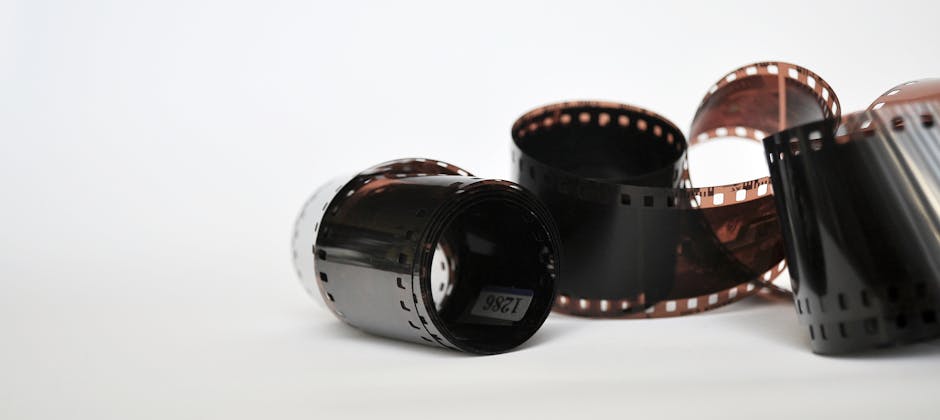 Close-up of SIM cards and ejector tool on white background, emphasizing telecommunication technology.