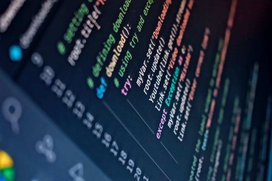 A group of diverse professionals collaborating in a modern office setting with laptops and technology.
