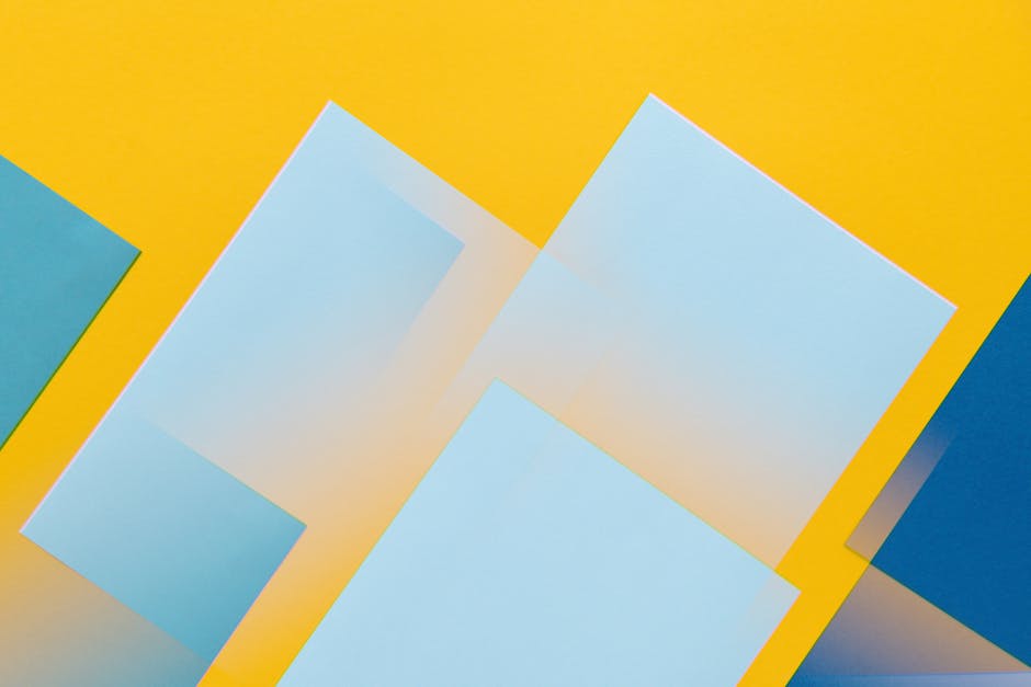 Vibrant abstract design with geometric shapes in blue and yellow hues.